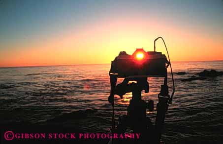Stock Photo #4803: keywords - camera cameras dawn dusk equipment horz ocean orange photo photographer photography picture seascape see sunrise sunset tool view