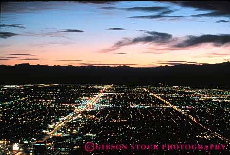 Stock Photo #4811: keywords -  area building city civilization community convert cover dark dusk engulf expand grid grow growing growth horizon horz las light lighting lights metropolitan neighborhood night out over power sprawl spread street streets sunset take urban urbanization vegas