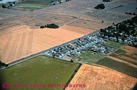 Stock Photo #4815: keywords -  aerial agricultural agriculture area building city civilization community convert cover engulf expand farm farming farms field fields grow growing growth horz land metropolitan neighborhood of out over sacramento sprawl spread take urban urbanization