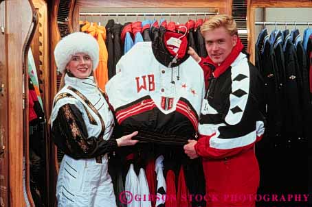 Stock Photo #4819: keywords -  browse business buy buyer clothes clothing coat commerce consumer couple customer display economics economy equipment examine horz jacket look merchandise outfit purchase purchasing released retail sale see sell share shop shopper shopping ski snow spend sport store together winter