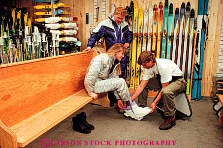 Stock Photo #4820: keywords -  boot boots browse business buy buyer clothes clothing commerce consumer couple customer display economics economy equipment examine horz look merchandise outfit purchase purchasing released retail sale see sell share shop shopper shopping ski snow spend sport store together winter