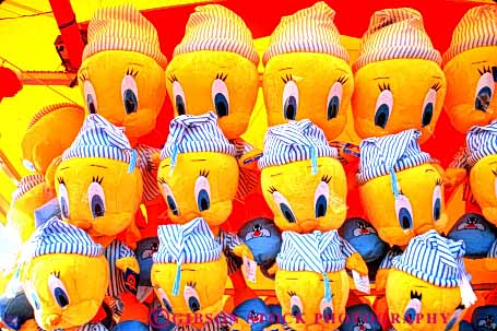 Stock Photo #4831: keywords - amusement animal animals array award buy color colorful commerce display economics economy game horz merchandise park play prize prizes retail sell stuffed toy toys yellow
