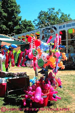 Stock Photo #4839: keywords -  amusement balloon buy color colorful commerce display economics economy fair festival inflated merchandise park plastic play retail sales sell toy toys vert