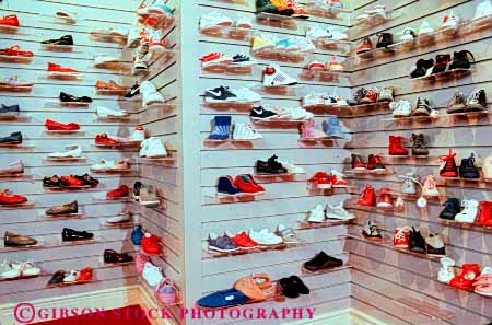 Stock Photo #4849: keywords -  advertise business commerce consume consumerism display economics economy enterprise exhibit horz inventory merchandise merchandising pair present product products promote retail retailer sale sales sell selling shoe shoes store trade