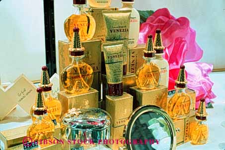Stock Photo #4851: keywords -  advertise aroma bottle bottles business commerce consume consumerism delicate display economics economy enterprise exhibit horz inventory merchandise merchandising odor perfume present product products promote retail retailer sale sales sell selling smell store trade