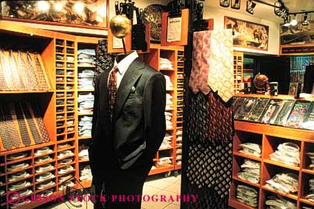 Stock Photo #4852: keywords -  advertise business clothing commerce consume consumerism display economics economy enterprise exhibit fancy horz inventory mens merchandise merchandising present product products promote retail retailer sale sales sell selling store suit tie trade