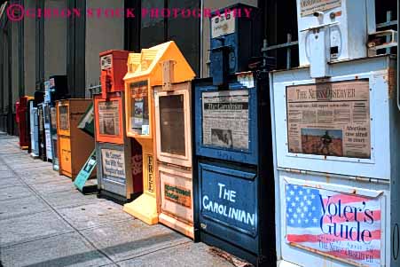 Stock Photo #4856: keywords -  advertise business commerce consume consumerism display economics economy enterprise exhibit horz inventory machine merchandise merchandising newspaper newspapers present product products promote racks retail retailer row sale sales sell selling store trade vendor