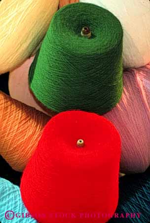 Stock Photo #4858: keywords -  array circle circles color colorful conical craft display exhibit knit knitter knitting material merchandise merchandising present product retail round sell selling sew sewing shape show spool spools supplies supply symmetrical symmetry thread vert yarn