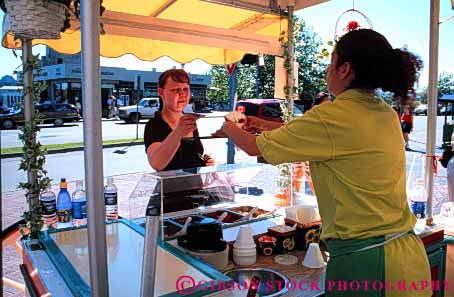 Stock Photo #4873: keywords - beverage business buyer buying cart commerce cream customer drink drinks eat economics food horz ice little lunch mobile movable one person portable retail sell seller selling serve service small snack summer sweets treat vendor wagon woman women