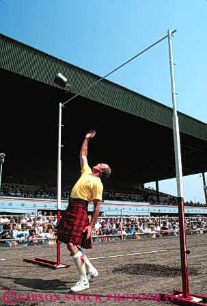 Stock Photo #4897: keywords -  and annual athlete athletic bar big california challenge clan clansmen compete competition competitor contest ethnic fair festival games hard heave heavy height highland lift male man meet men mighty over rosa santa scot scottish strength strong throw toss tradition traditional up vert weight