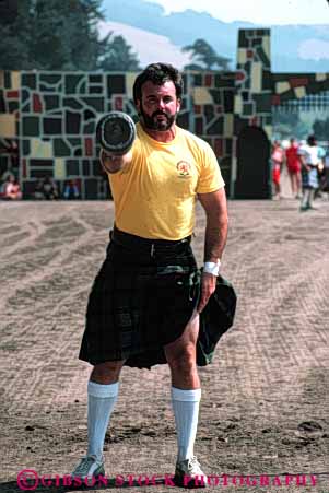 Stock Photo #4898: keywords -  and annual athlete athletic bar big california challenge clan clansmen compete competition competitor contest ethnic fair festival games hard heave heavy height highland life male man meet men mighty over rosa santa scot scottish strength strong throw toss tradition traditional up vert weight