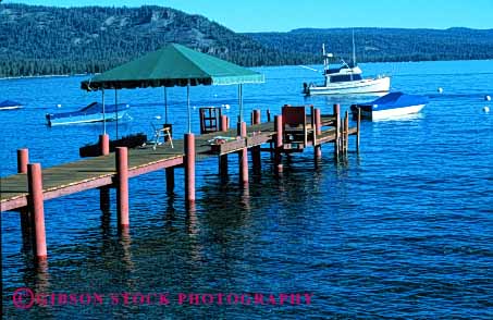 Stock Photo #4904: keywords - boat california calm dock horz lake landscape motorboat mountain resort scenic shore tahoe water wood yacht
