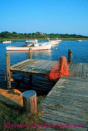 Stock Photo #4913: keywords -  atlantic boat boats calm cape chatham coast cod dock landscape massachusetts motorboat ocean scenic sea seascape shore vert water wood