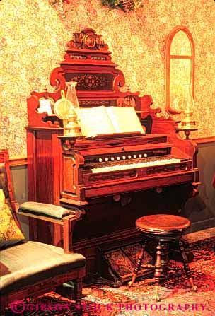 Stock Photo #4916: keywords - americana antique antiques collector collectors hand historic history instrument item junk keyboard music musical old organ pump second tradition traditional used valuable vert vintage