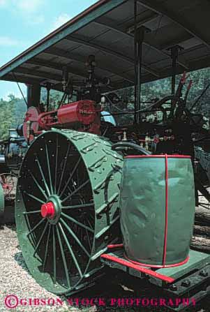 Stock Photo #4919: keywords -  americana antique antiques collector collectors equipment farm hand historic history item junk metal obsolete old rotate round second steel tractor tradition traditional used valuable vehicle vert vintage wheel