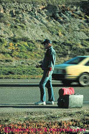 Stock Photo #4975: keywords - ask auto beg car carry gesture hand highway hike hiker hiking hitch man pick request ride road signal street symbol thumb travel up vehicle vert