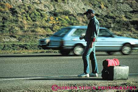 Stock Photo #4976: keywords - ask auto beg car carry gesture hand highway hike hiker hiking hitch horz man pick request ride road signal street symbol thumb travel up vehicle