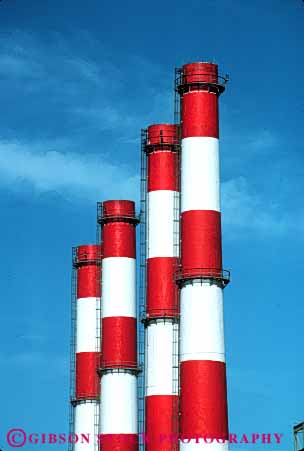 Stock Photo #4978: keywords -  air aviation color colorful cylinder cylindrical discharge emission exhaust factory four hazard hollow industrial industry parallel pollution quality red round smoke stacks tall tube vert white