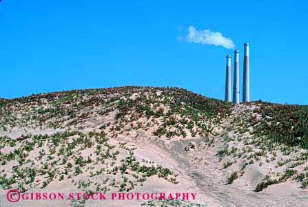 Stock Photo #4980: keywords -  air aviation cylinder cylindrical discharge emission exhaust factory hazard hollow horz industrial industry pollution quality round smoke stacks steam tall three tube