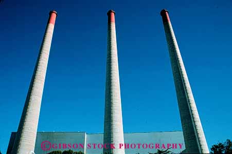 Stock Photo #4982: keywords -  air aviation cylinder cylindrical discharge emission exhaust factory hazard hollow horz industrial industry parallel pollution quality round smoke stacks tall three tube