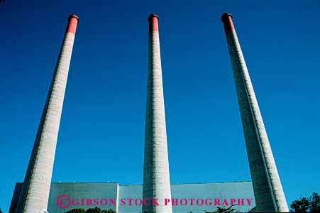 Stock Photo #4982: keywords - air aviation cylinder cylindrical discharge emission exhaust factory hazard hollow horz industrial industry parallel pollution quality round smoke stacks tall three tube