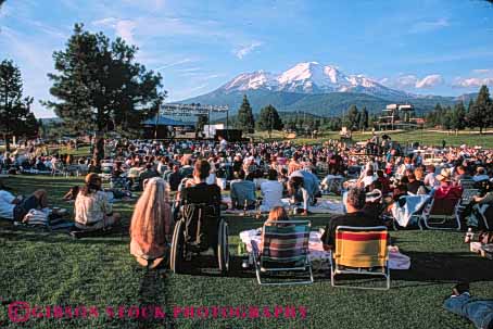 Stock Photo #4987: keywords -  array audience concert crowd crowded evening gather gathered gathering grass grouped horz lawn lots many mount mountain mt mt. multitude observe outdoor outside people see shasta together watch