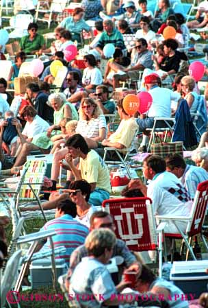 Stock Photo #4988: keywords -  array audience concert crowd crowded gather gathered gathering grouped lots many multitude observe outdoor people see together vert watch