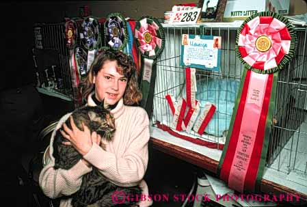 Stock Photo #5006: keywords -  affection animal award awards care cat close competing competition display for fur groom horz love mammal manicure pet ribbon show special together train winning