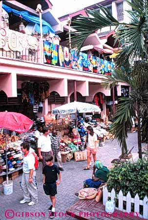 Stock Photo #5009: keywords -  air bahamas buy commerce display economics economy market markets merchandise nassau open outdoor outside promote retail retailing sell seller sells shopping shops show straw trade vert