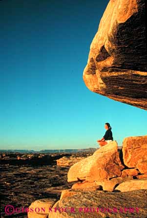 Stock Photo #5018: keywords -  alone calm meditate meditating meditation meditator metaphysical outdoor outdoors outside peace peaceful pray privacy private quiet released rock serene solemn solitude spirit vert woman