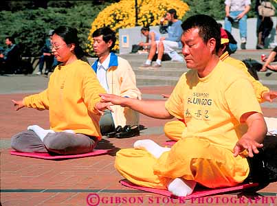 Stock Photo #11290: keywords -  asian berkeley california calm demon demonstration ethnic falun gong horz meditate meditates meditating meditation meditators minority of outdoor outside people relax relaxed relaxing shirt sit sits sitting university yellow