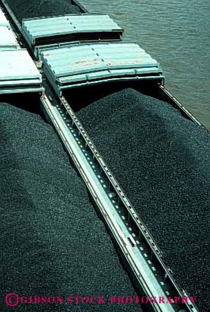 Stock Photo #5026: keywords - barges black carrying coal energy industry iowa natural resource river shipping vert