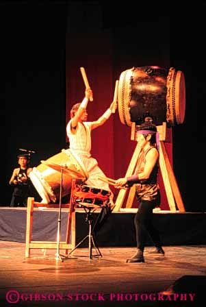 Stock Photo #5027: keywords -  act acting actors actress art display drama dramatic drum drummers drumming ethnic japanese percussion perform performance performers performing production show skill stage taiko tradition traditional vert visual