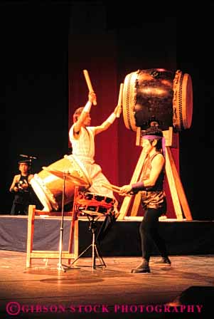 Stock Photo #5027: keywords - act acting actors actress art display drama dramatic drum drummers drumming ethnic japanese percussion perform performance performers performing production show skill stage taiko tradition traditional vert visual