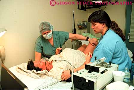 Stock Photo #5048: keywords -  attend baby birth birthing care horz hospital in labor medical medicine mother motherhood nurses pain woman
