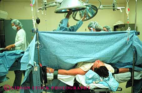 Stock Photo #5050: keywords - birth birthing caesarean cut doctor doctors emergency horz hospital medical medicine motherhood preparation procedure sterile surgeon surgery