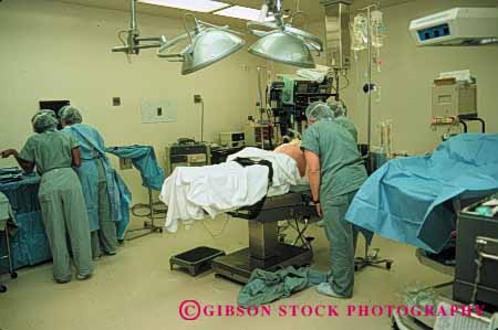 Stock Photo #5053: keywords -  birth birthing caesarean doctor doctors emergency horz hospital medical medicine motherhood preparation procedure sterile surgeon surgery