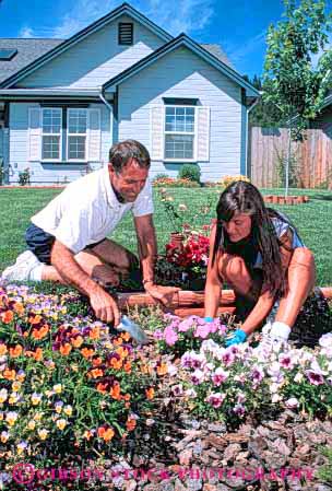 Stock Photo #5061: keywords -  build cooperate couple create cultivate garden gardener gardening grower grown hobby home house outdoor outdoors outside plant plants released residence residential share skill soil summer together vert work