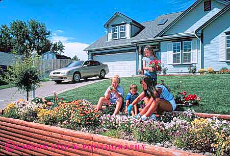 Stock Photo #5065: keywords - alone child children cultivate family flower flowers fun garden gardener gardening grower grown help helper helping helps hobby home horz kid kids mother outdoor outdoors outside parent plant plants play released residence residential single skill soil summer together wife woman work