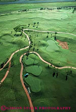 Stock Photo #5076: keywords -  aerial close course cut elevate elevated game golf golfing grass green groom groomed hawaii landscape landscaped lawn lihue manicure manicured route smooth trim trimmed vert westin