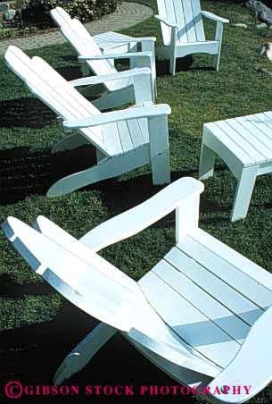 Stock Photo #5086: keywords -  array chairs design exterior furniture grass lawn outdoor outside pattern repeat repetition same seat similar sit summer vert white wood