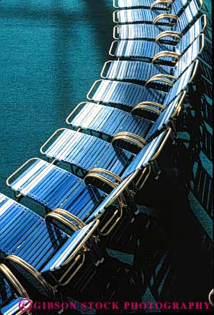 Stock Photo #5087: keywords -  aluminum arc array chairs chase cruise curve deck design exterior furniture line lounge neat organize organized parallel pattern plastic repeat repetion resistant row seat ship sit synthetic vert weather