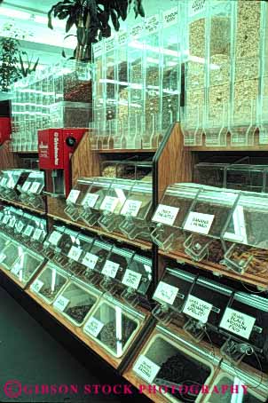 Stock Photo #5093: keywords - array business buy commerce consumer diet dietary display food free health healthy jar marketing merchandising natural nutrition organic pattern repeat repetition residue retail row rows sale sell shelf shelves supplement supplements vert vitamin