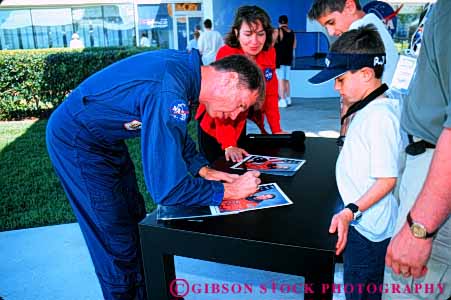 Stock Photo #5101: keywords -  astronaut autograph boy celebrity center exploration explore explorer horz kennedy nasa rick searfoss sign souvenir space
