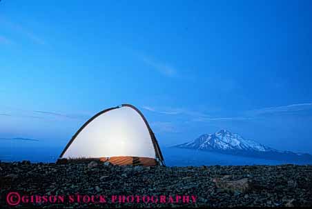 Stock Photo #5105: keywords -  alone anchor angle angular backpack backpacker camp camping dark dawn dusk engineer engineered engineering fabric geometric geometry horz landscape lift line lines mount mountain outdoor outside roof shasta shelter small solitary sport sunrise sunset tension tent wilderness