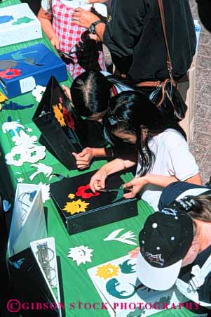 Stock Photo #5121: keywords - activity annual asian child children craft crafts day display earth ecology education environment ethnic event exhibit fair festival gathering girl jacksonville learn meeting show together vert wildlife