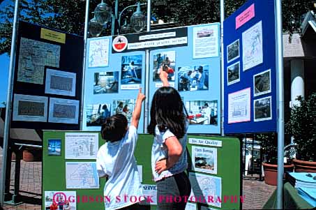 Stock Photo #5125: keywords -  activity annual boy child children day display earth ecology education environment event exhibit fair festival gathering horz jacksonville learn meeting quality show together two water wildlife