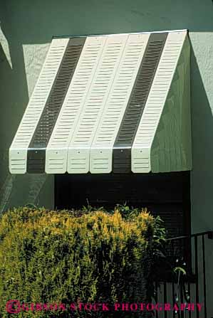 Stock Photo #5128: keywords - architecture awning awnings building cool cooling cover home house metal protect protection shade sun sunny sunshine vert window windows