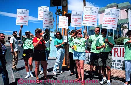 Stock Photo #5139: keywords -  attention attitude attract belief believe controversial controversy debatable debate demand demonstrate demonstration dissatified employee expression group horz idea issue las object opinion placard placards position protect share shirt sidewalk sign signs social society statement team together unified uniform union unity vegas work workers