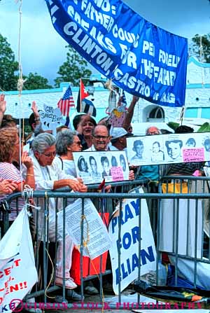 Stock Photo #5140: keywords - attitude belief believe controversial controversy debatable debate demand demonstrate demonstration elian ethnic expression gonzalez group hispanic house idea issue miami object opinion people political position protect rallies rally share sign social society statement together unified united unity vert